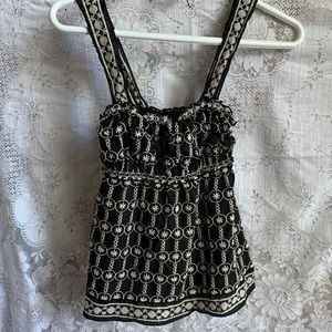 Adorable black ruched top with cream stitched details. Max Studio size small.